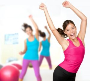 women dancing gym reduce appetite