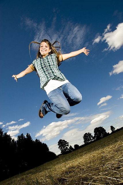 girl happy jump