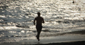 man-running-on-the-beach
