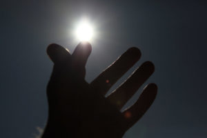 hormones hand touching sun