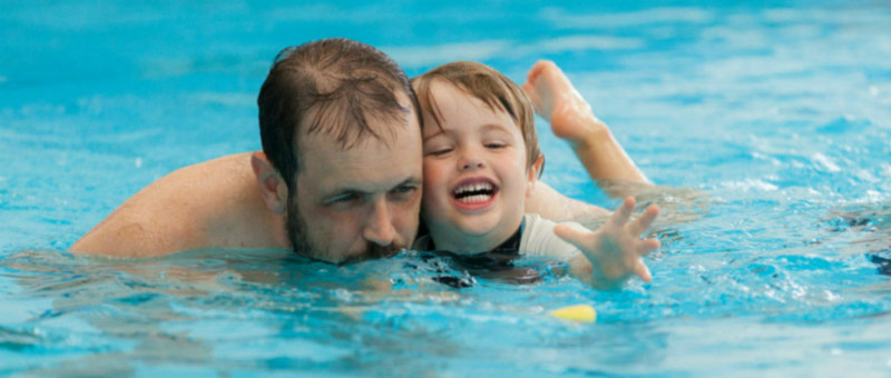 swim chiold with parent